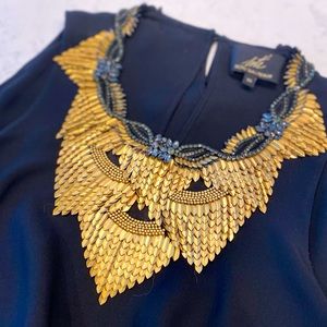 Designer top, cold shoulder blouse with neck detail. Only worn once!